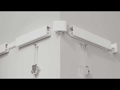 STAS minirail calha para pendurar quadros, disponível em branco e alumínio natural, discreto e fácil de instalar.